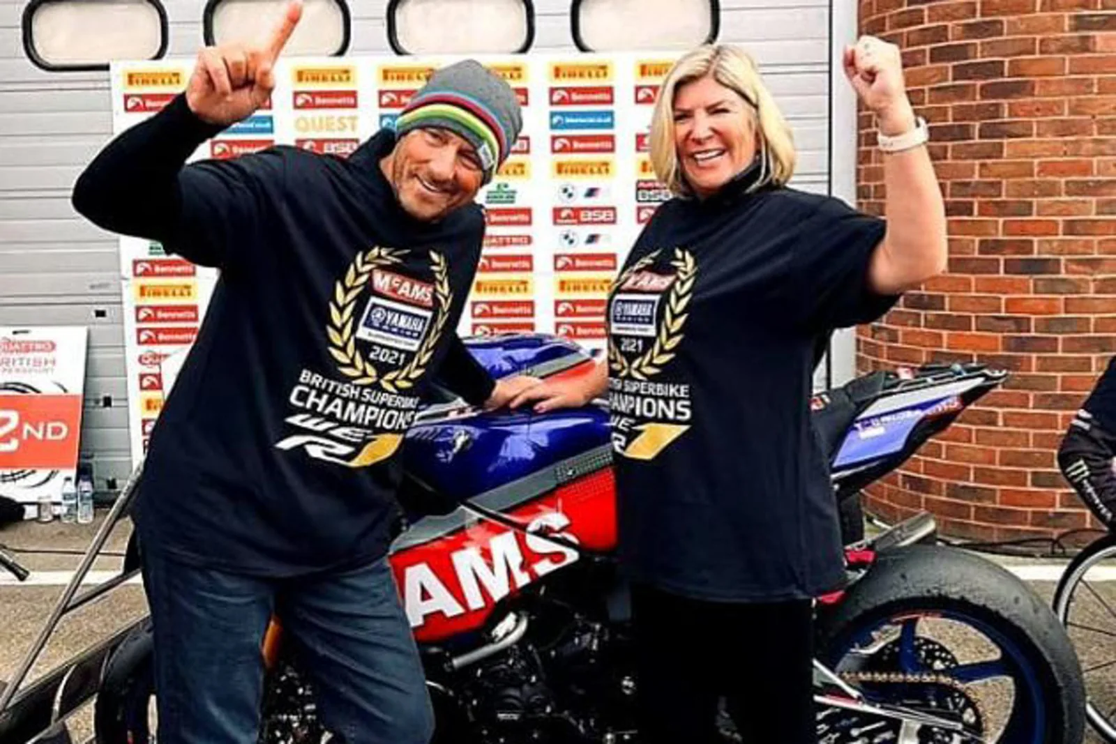 James and family celebrating a motorcycle racing championship