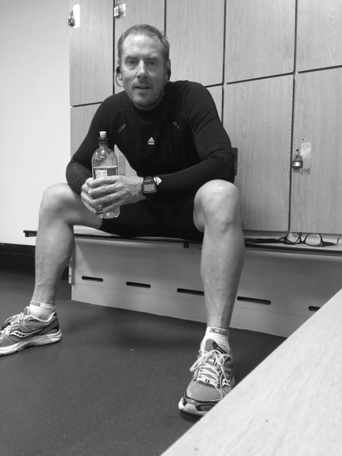 James sitting in a gym after training